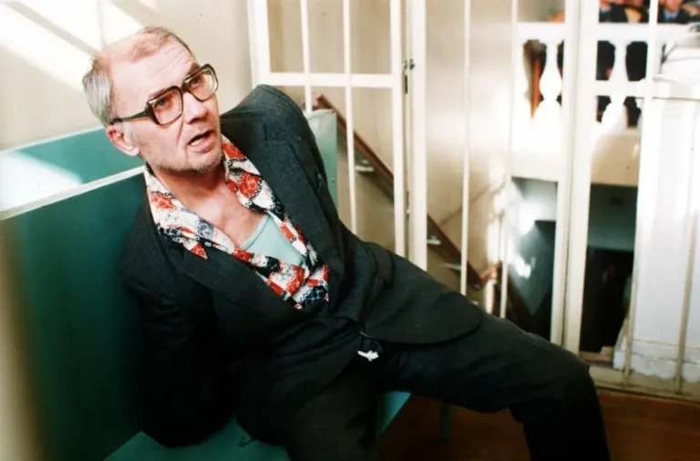 Andrei Chikatilo sitting in a prison cell