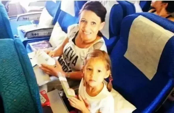 Family selfie aboard MH17 before takeoff