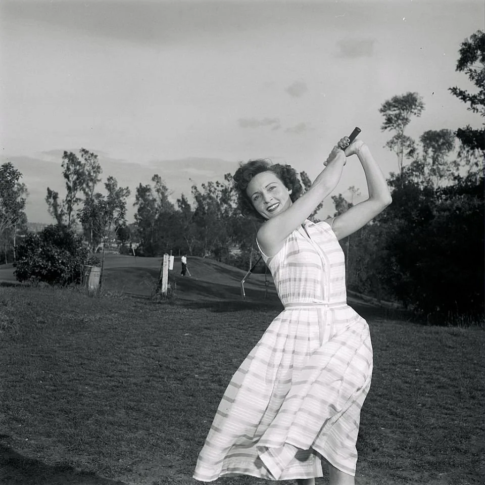 Young Betty White in a candid, relaxed moment off-camera