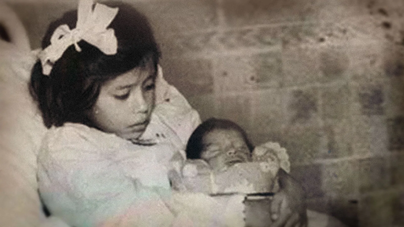young Lina Medina with her newborn child